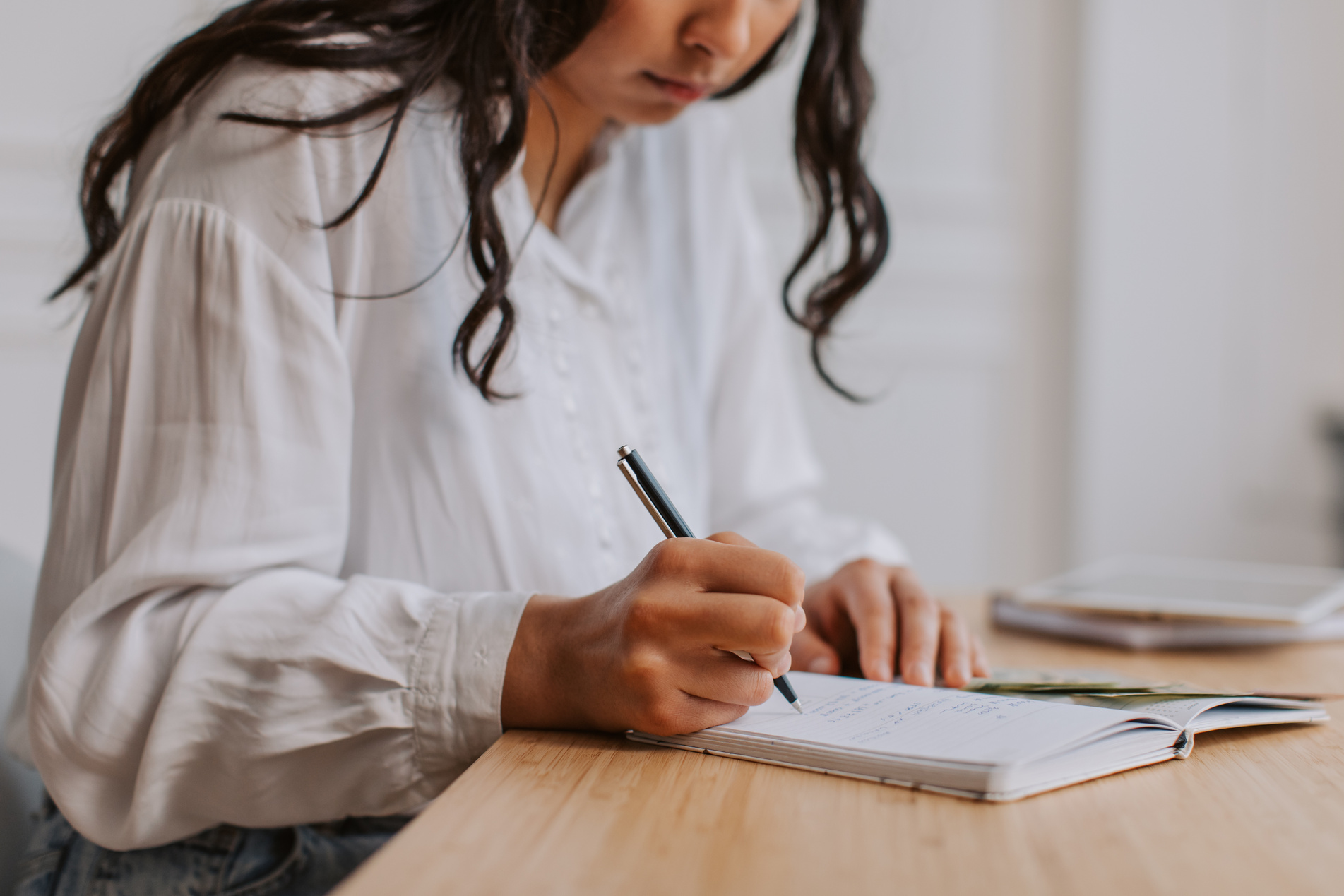 Woman Budgeting Her Cash